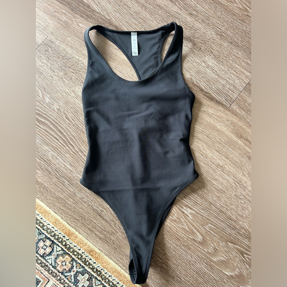Alo Sleek Bodysuit in black, new, size small
